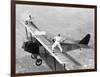 Daredevils Playing Tennis on a Biplane-null-Framed Photographic Print