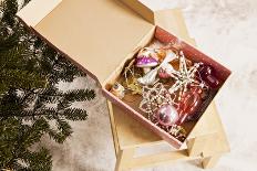 Box with Chistmas Ornaments Next to Christmas Tree, Munich, Bavaria, Germany-Dario Secen-Framed Stretched Canvas