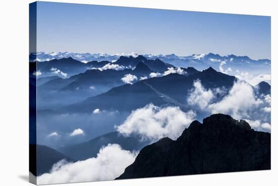 Dark Bergsilhouetten and Light Clouds in Tyrol-Rolf Roeckl-Stretched Canvas