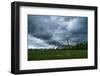 Dark clouds above a football pitch-Benjamin Engler-Framed Photographic Print