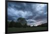 Dark clouds above a park-Benjamin Engler-Framed Photographic Print