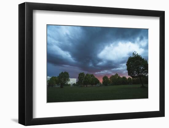 Dark clouds above a park-Benjamin Engler-Framed Photographic Print