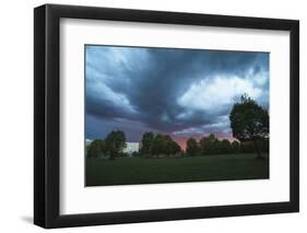 Dark clouds above a park-Benjamin Engler-Framed Photographic Print