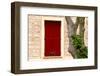 Dark red shutters in the wall of a house in France.-Tom Haseltine-Framed Photographic Print