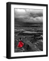 Dark storm clouds over Dead Horse Point State Park with girl in red dress standing near the cliff-David Chang-Framed Photographic Print