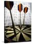 Darts on a Dartboard with Stock Figures in the Background-null-Stretched Canvas