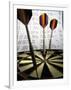 Darts on a Dartboard with Stock Figures in the Background-null-Framed Premium Photographic Print