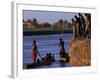 Dassanech Tribesmen and Women Load into a Dugout Canoe Ready to Pole across the Omo River, Ethiopia-John Warburton-lee-Framed Photographic Print