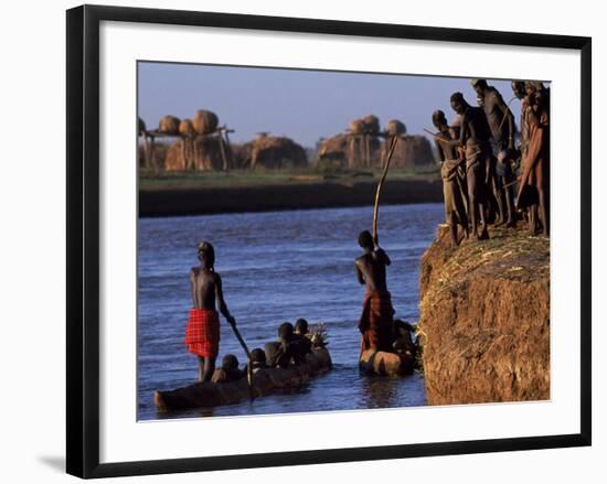 Dassanech Tribesmen and Women Load into a Dugout Canoe Ready to Pole across the Omo River, Ethiopia-John Warburton-lee-Framed Photographic Print