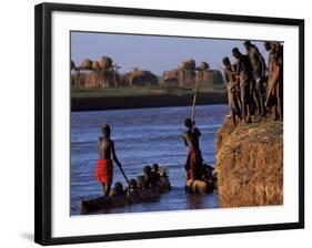 Dassanech Tribesmen and Women Load into a Dugout Canoe Ready to Pole across the Omo River, Ethiopia-John Warburton-lee-Framed Photographic Print