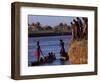 Dassanech Tribesmen and Women Load into a Dugout Canoe Ready to Pole across the Omo River, Ethiopia-John Warburton-lee-Framed Photographic Print