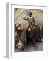 Datoga Woman Relaxes Outside Her Thatched House, Tanzania-Nigel Pavitt-Framed Photographic Print