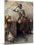 Datoga Woman Relaxes Outside Her Thatched House, Tanzania-Nigel Pavitt-Mounted Photographic Print