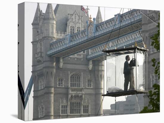 David Blaine, the American Illusionist and Street Magician in Front of Tower Bridge in London-null-Stretched Canvas