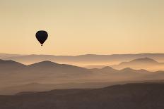 Single Hot Air Balloon over a Misty Dawn Sky, Cappadocia, Anatolia, Turkey, Asia Minor, Eurasia-David Clapp-Photographic Print