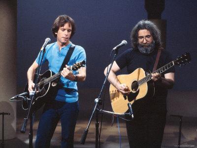 Musicians Bob Weir and Jerry Garcia of Rock Group Grateful Dead Performing