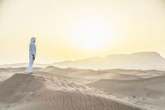 Arab Man Standing in Sand Dunes near Dubai.-David Trood-Stretched Canvas