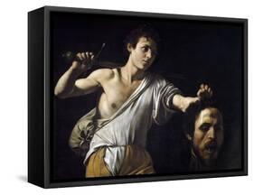 David with the Head of Goliath by Caravaggio-null-Framed Stretched Canvas