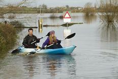 Couple in Kayak During January 2014 Flooding-David Woodfall-Stretched Canvas