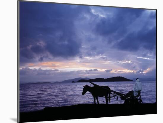 Dawn at Lake Ziway, Central Ethiopia, with the Silhouette of a Horse-Drawn Buggy-Nigel Pavitt-Mounted Photographic Print