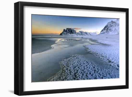 Dawn Illuminates the Beach Covered with Frozen Snow in the Cold Sea of Uttakleiv-Roberto Moiola-Framed Photographic Print