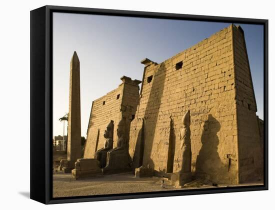 Dawn over the Impressive First Pylon of Luxor Temple, Egypt-Julian Love-Framed Stretched Canvas