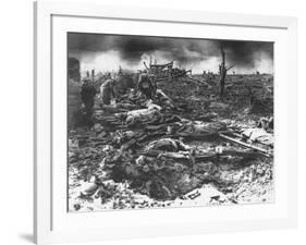 Dawn Rising on Muddy, Horrific Battlefield of Passchendaele as Soldiers Tend to the Dead During WWI-null-Framed Photographic Print