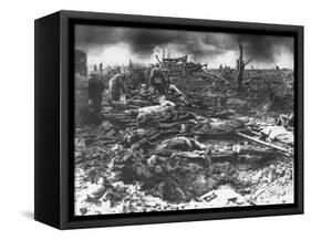 Dawn Rising on Muddy, Horrific Battlefield of Passchendaele as Soldiers Tend to the Dead During WWI-null-Framed Stretched Canvas