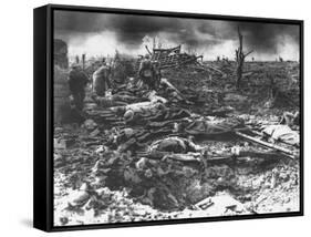Dawn Rising on Muddy, Horrific Battlefield of Passchendaele as Soldiers Tend to the Dead During WWI-null-Framed Stretched Canvas