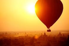 Silhouette of Hot Air Balloon over Bagan in Myanmar, Tourists Watching Sunrise over Ancient City-Daxiao Productions-Stretched Canvas