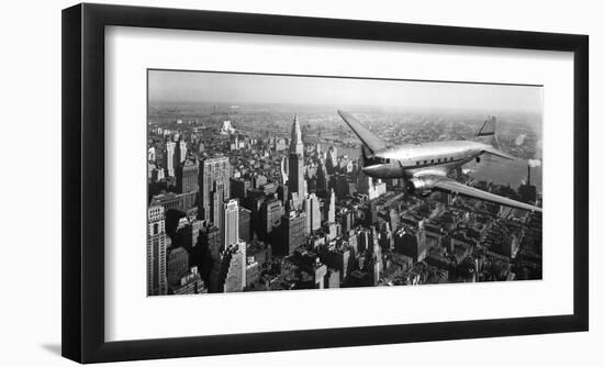 DC-4 over Manhattan, NYC-null-Framed Art Print