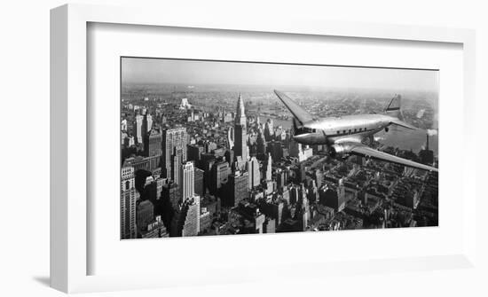 DC-4 over Manhattan, NYC-null-Framed Art Print