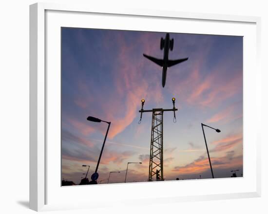 Dc9 Aircraft Approaching over Runway Landing Light Gantries at Sunset, London, England, United King-Charles Bowman-Framed Photographic Print