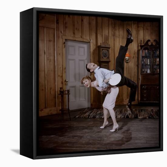 Debbie Reynolds Lifts Fellow Actor Tony Randall in a Scene from 'The Mating Game', 1959-Allan Grant-Framed Stretched Canvas