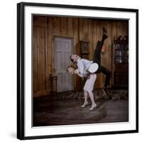 Debbie Reynolds Lifts Fellow Actor Tony Randall in a Scene from 'The Mating Game', 1959-Allan Grant-Framed Photographic Print