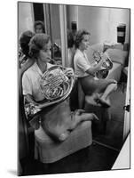 Debbie Reynolds Playing French Horn for Relaxation-Allan Grant-Mounted Premium Photographic Print