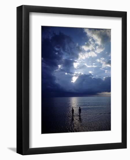 December 1946: Children Wading in the Water During a Late Afternoon Storm at Montego Bay, Jamaica-Eliot Elisofon-Framed Photographic Print