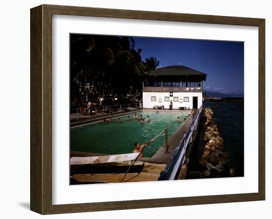 December 1946: Guests Swimming in the Pool at Myrtle Bank Hotel in Kingston, Jamaica-Eliot Elisofon-Framed Photographic Print