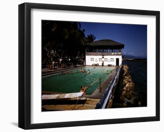 December 1946: Guests Swimming in the Pool at Myrtle Bank Hotel in Kingston, Jamaica-Eliot Elisofon-Framed Photographic Print