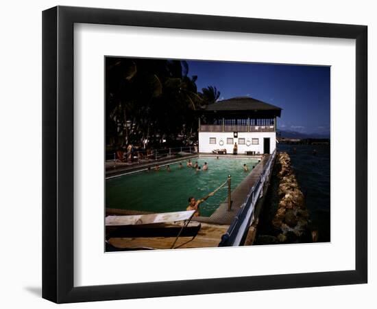 December 1946: Guests Swimming in the Pool at Myrtle Bank Hotel in Kingston, Jamaica-Eliot Elisofon-Framed Photographic Print