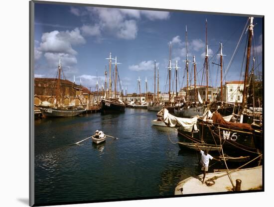 December 1946: Harbor Police in a Row Boat in Bridgetown Harbor, Barbados-Eliot Elisofon-Mounted Photographic Print