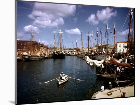 December 1946: Harbor Police in the Rowboat in Bridgetown Harbor, Barbados-Eliot Elisofon-Mounted Photographic Print