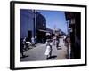 December 1946: Passersby at Market Street in Montego Bay, Jamaica-Eliot Elisofon-Framed Photographic Print