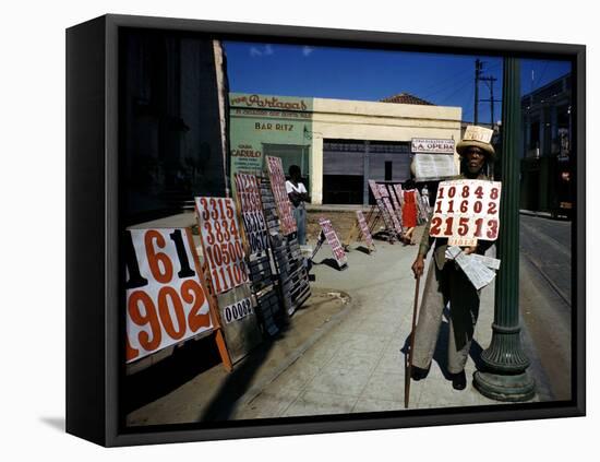 December 1946: War Veteran Sells Lottery Tickets for the Government Lottery in Camaguey, Jamaica-Eliot Elisofon-Framed Stretched Canvas