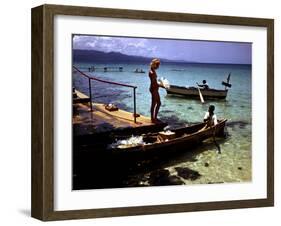 December 1946: Woman and Fishermen at Doctor's Cave Beach in Montego Bay, Jamaica-Eliot Elisofon-Framed Photographic Print