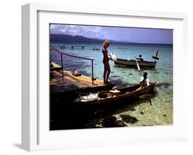 December 1946: Woman and Fishermen at Doctor's Cave Beach in Montego Bay, Jamaica-Eliot Elisofon-Framed Photographic Print