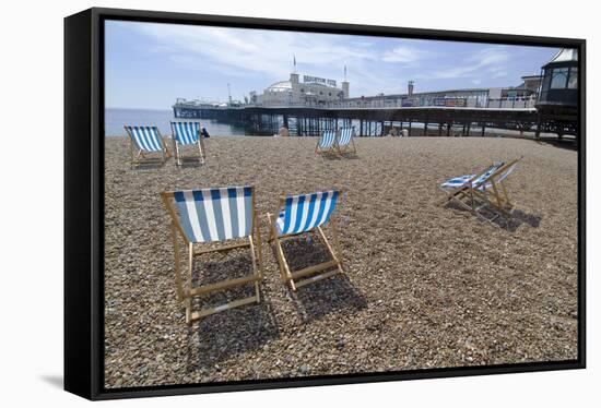 Deck chairs on the pebble beach in Brighton-Natalie Tepper-Framed Stretched Canvas