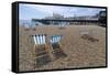 Deck chairs on the pebble beach in Brighton-Natalie Tepper-Framed Stretched Canvas