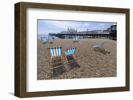 Deck chairs on the pebble beach in Brighton-Natalie Tepper-Framed Photo