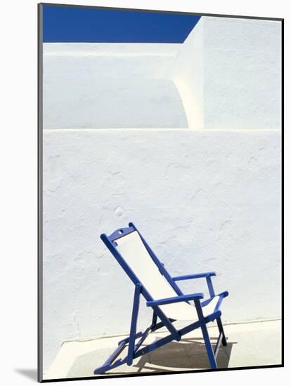 Deckchair Against Whitewashed Wall, Imerovigli, Santorini (Thira), Cyclades Islands, Greece-Lee Frost-Mounted Photographic Print